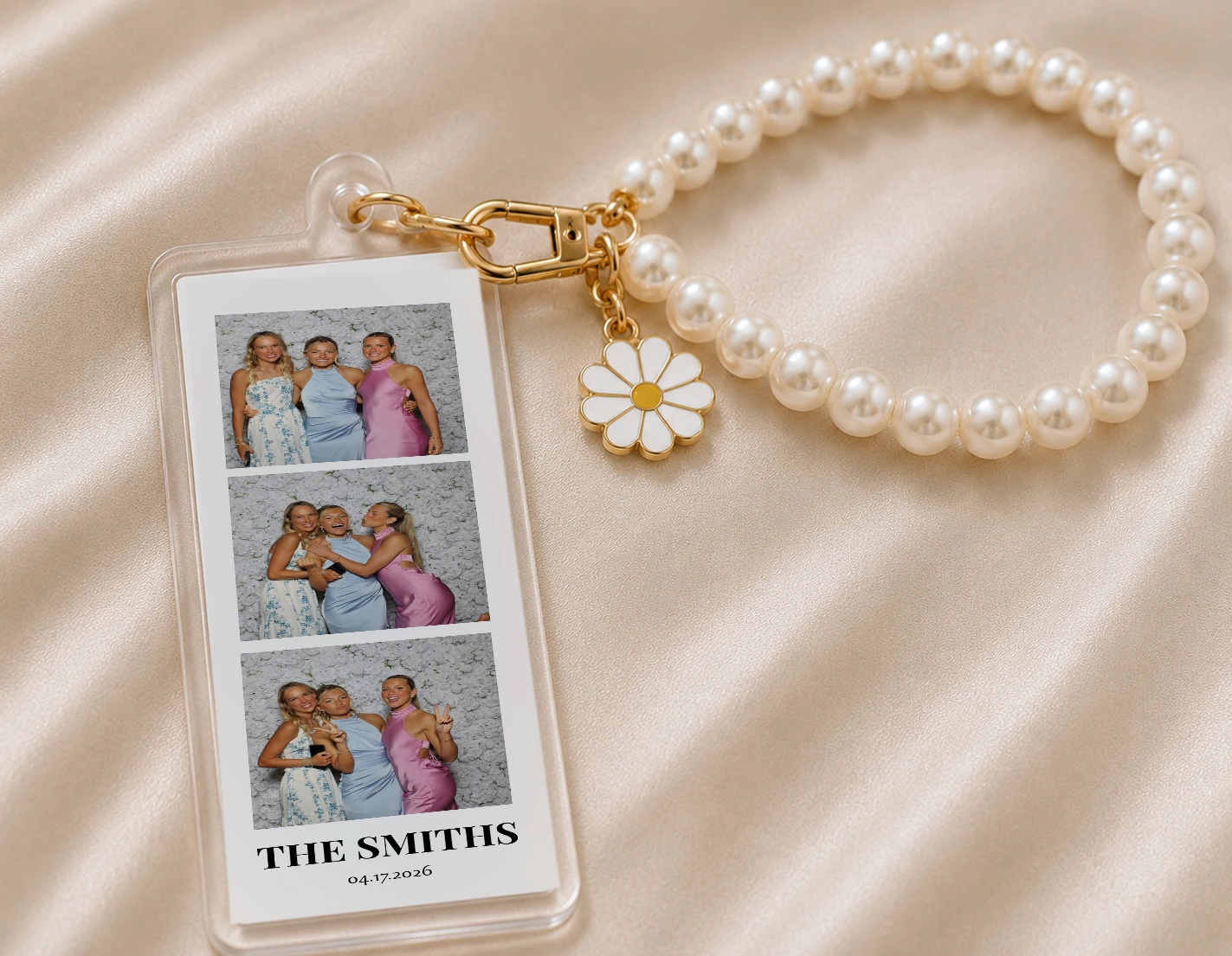Personalized 2x6 photo strip keychain with gold clasp, daisy charm and pearl wristlet